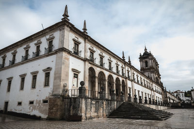 View of historical building against cloudy sky