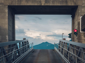 Low angle view of drawbridge against sky during sunset