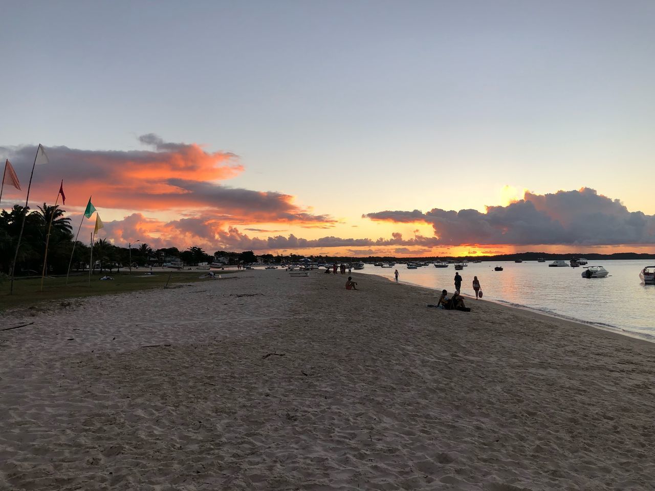 SILHOUETTE PEOPLE ON BEACH DURING SUNSET