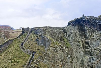 Rock formations on landscape against sky