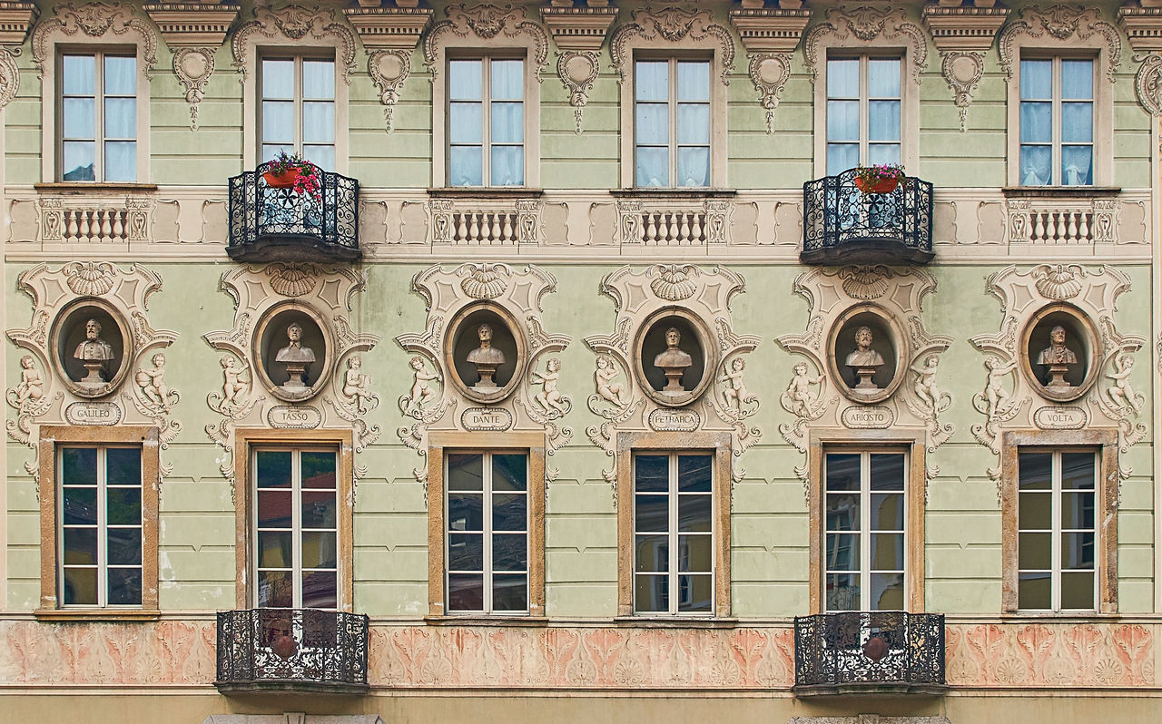 LOW ANGLE VIEW OF BUILDING WITH WINDOWS