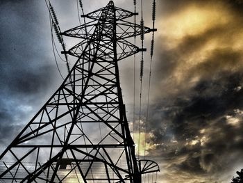 Low angle view of electricity pylon