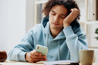 Young woman using mobile phone