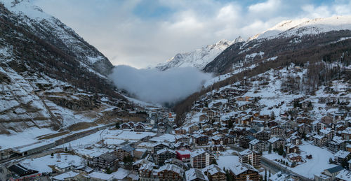 Aerial view of townscape against sky