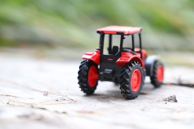 Close-up of toy car on land