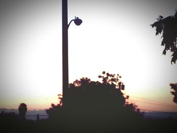 Low angle view of street light against clear sky