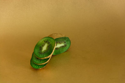 Close-up of fruit over white background