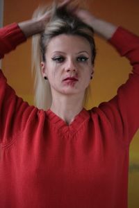 Close-up of woman with smudged make-up