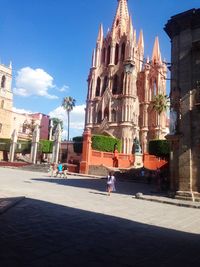 Low angle view of church against blue sky