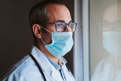 Portrait of man wearing eyeglasses