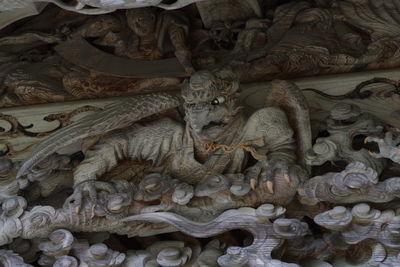 Close-up of angel sculpture in temple