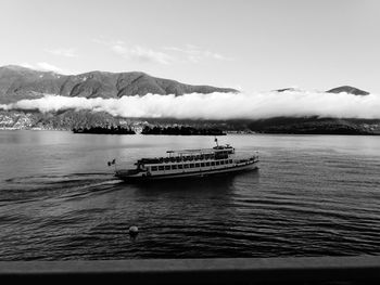 Boat in lake against sky