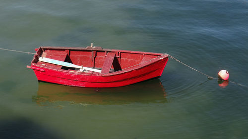 High angle view of red boat in sea