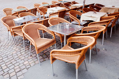 High angle view of chairs and table at restaurant