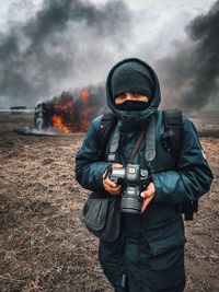 Midsection of man wearing mask