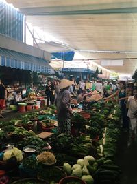 People at market stall