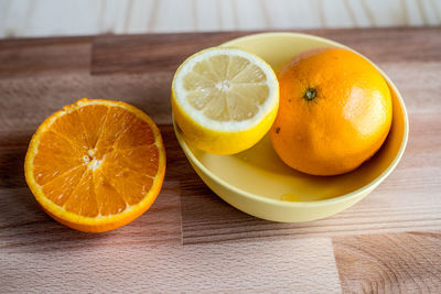 Close-up of orange fruit on table
