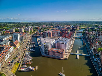 High angle view of river amidst buildings in city