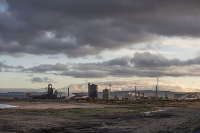 Buildings in city against sky