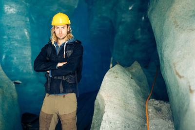 Full length of man standing on rock