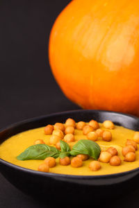 Close-up of pumpkin served in bowl on table