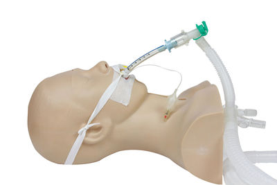 Close-up of electric lamp against white background