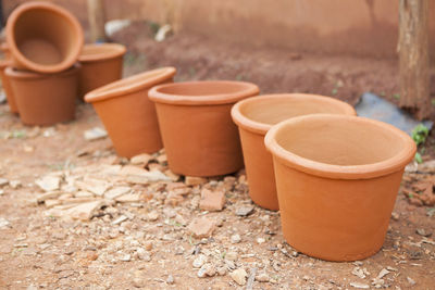 Close-up of clay pots on ground