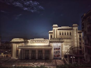 Old building against sky at night