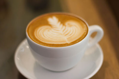 Close-up of a white coffee cup