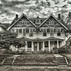 Built structure against cloudy sky