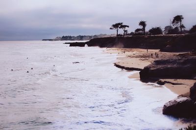 Scenic view of sea against cloudy sky