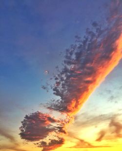 Low angle view of dramatic sky during sunset