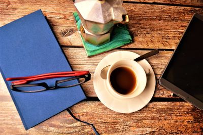 High angle view of coffee cup on table