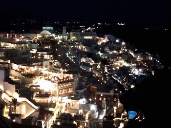 Illuminated cityscape at night