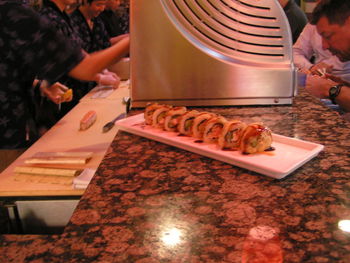 Close-up of man preparing food