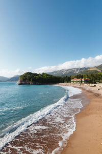 Scenic view of beach against sky