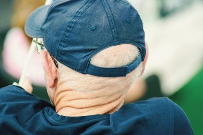 Rear view of man wearing cap 