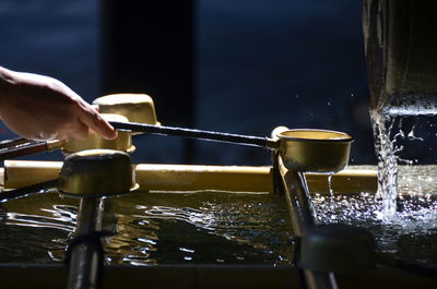 Washing hands at japanese temple