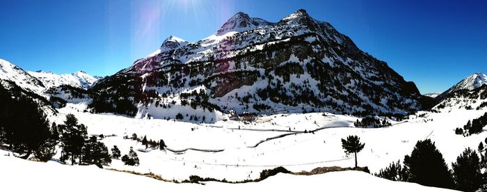 Scenics shot of snow covered mountain and ski resorts