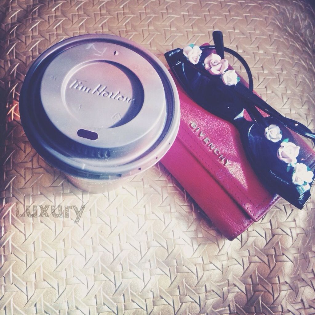 indoors, high angle view, table, still life, directly above, wood - material, coffee cup, technology, food and drink, close-up, coffee - drink, cup, elevated view, equipment, container, overhead view, communication