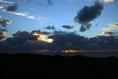 Low angle view of dramatic sky during sunset