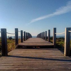 View of bridge against blue sky