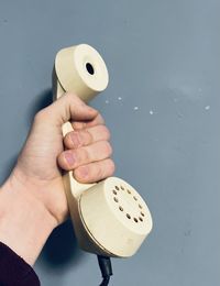 High angle view of person hand holding ice cream