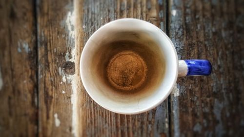 High angle view of coffee cup on table