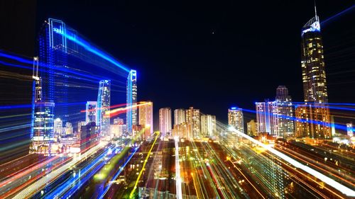 Illuminated buildings against the sky