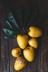 Close-up of fruits on wood