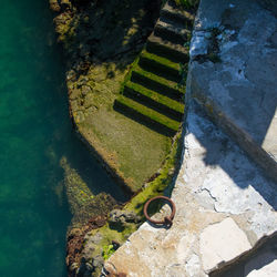 High angle view of steps and sea