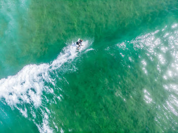 High angle view of people in sea