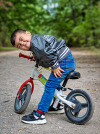 Boy 3 years old  riding a bicycle 
