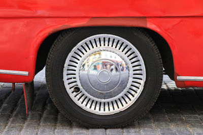 Close-up of car on road